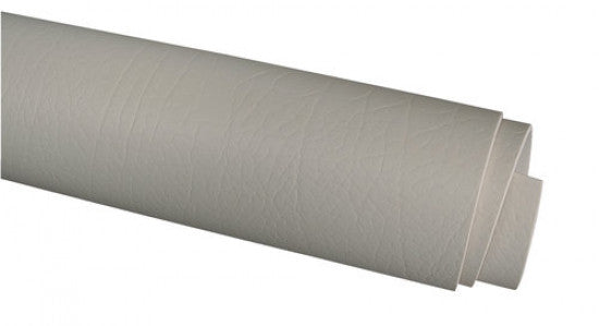 SeaTec indretningsmateriale i beige, rullet op på en sort baggrund